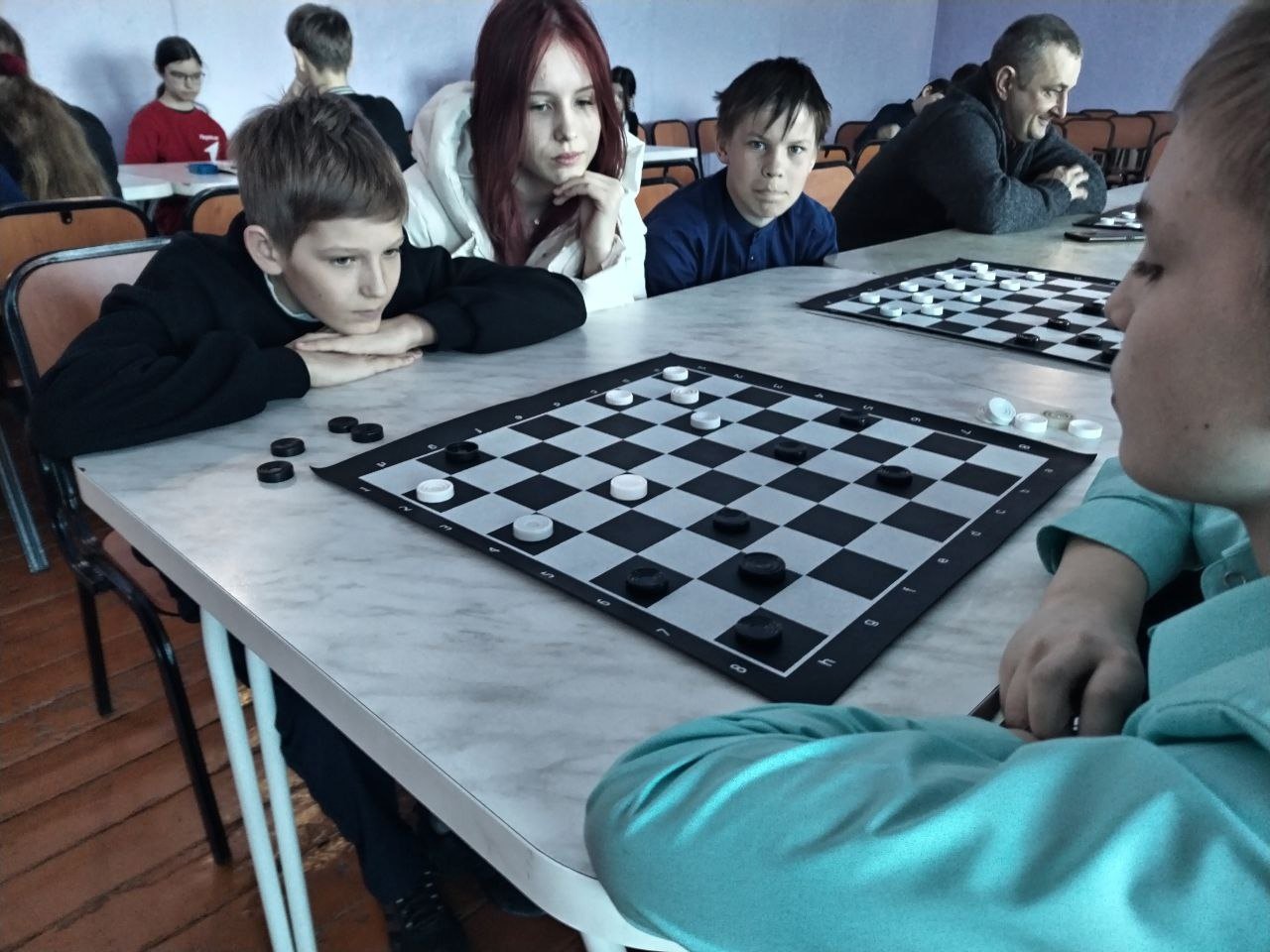 Семейный турнир по шашкам.